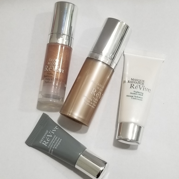 REVIVE COSMETICS SET OF 4 WITH BAG! - Picture 2 of 6